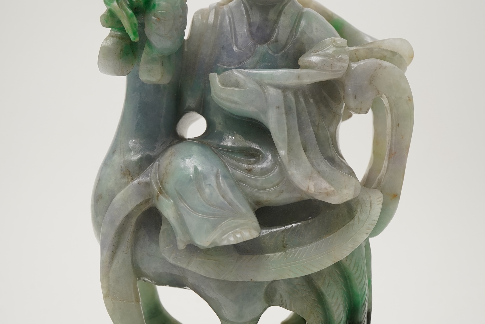 A Chinese jadeite figure of Xi Wangmu riding on a phoenix, late 19th/early 20th century